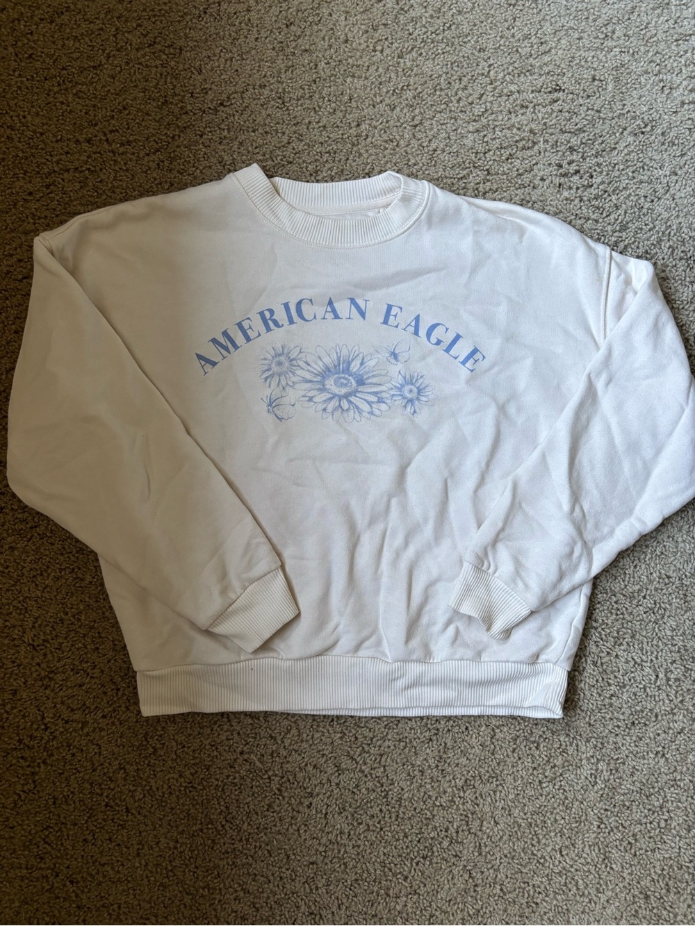 American Eagle Outfitters White Sweatshirt with Light Blue Floral Logo
